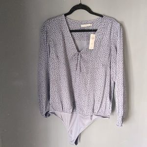 Leopard print body suit